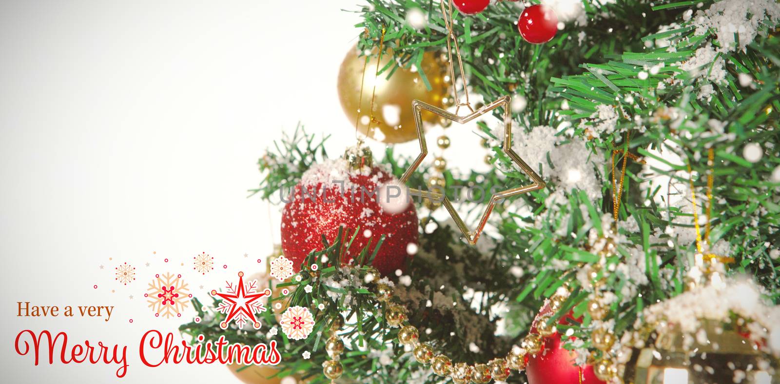 Christmas card against close-up of christmas tree with decorations