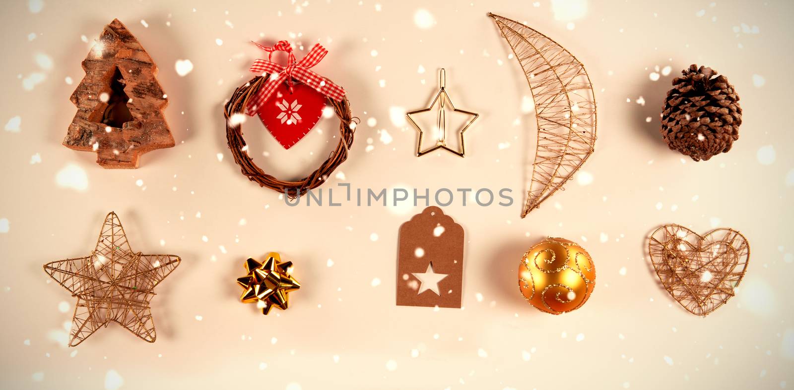 Snow falling against christmas decorations in a square shape