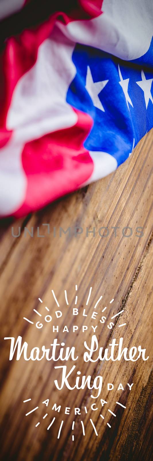 happy Martin Luther King day, god bless america against usa flag on table