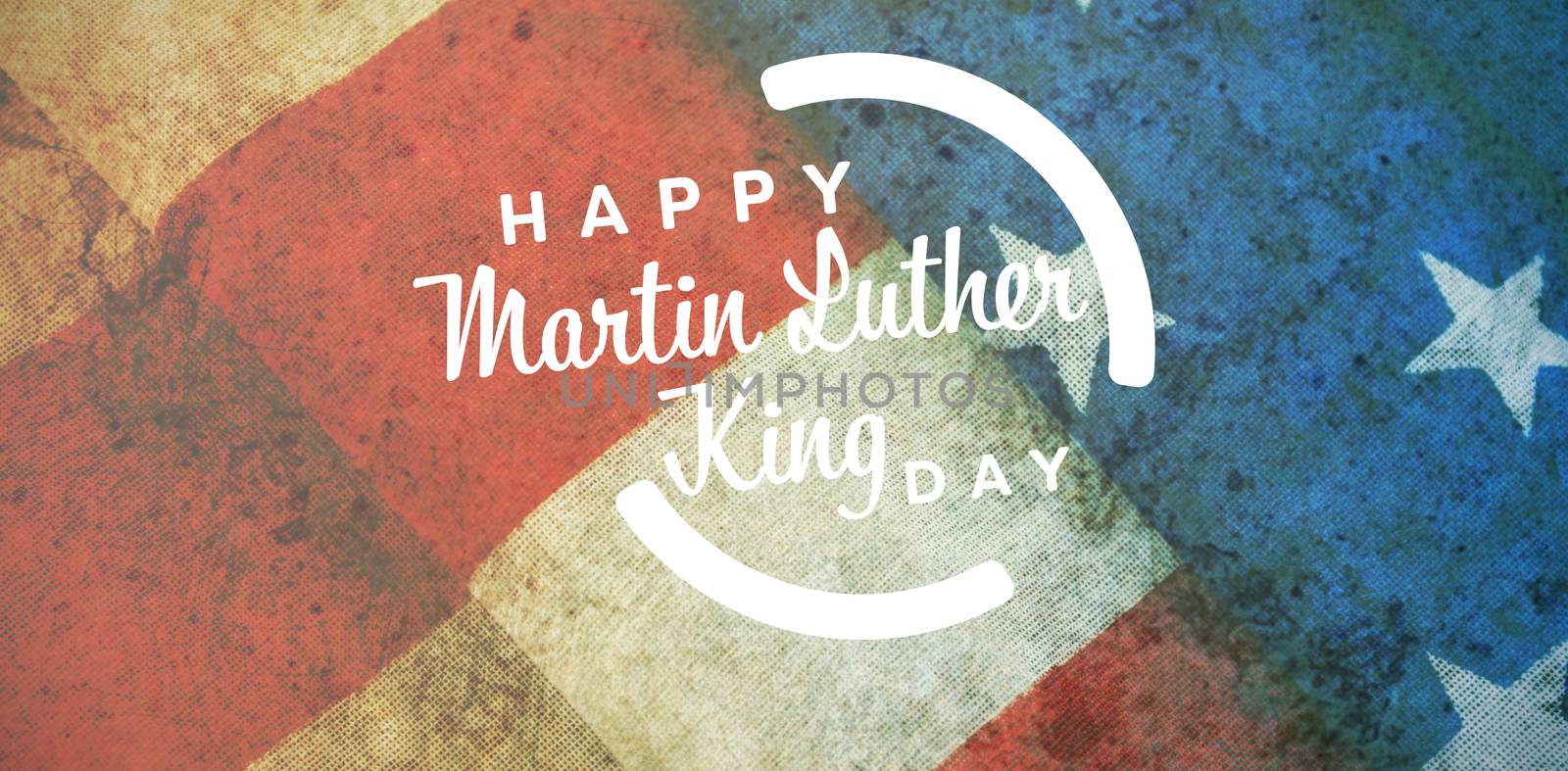 happy Martin Luther King day against close-up of folded american flag