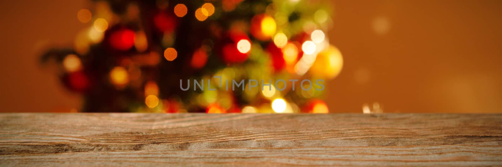 wooden table against white carpet against unfocused decoration