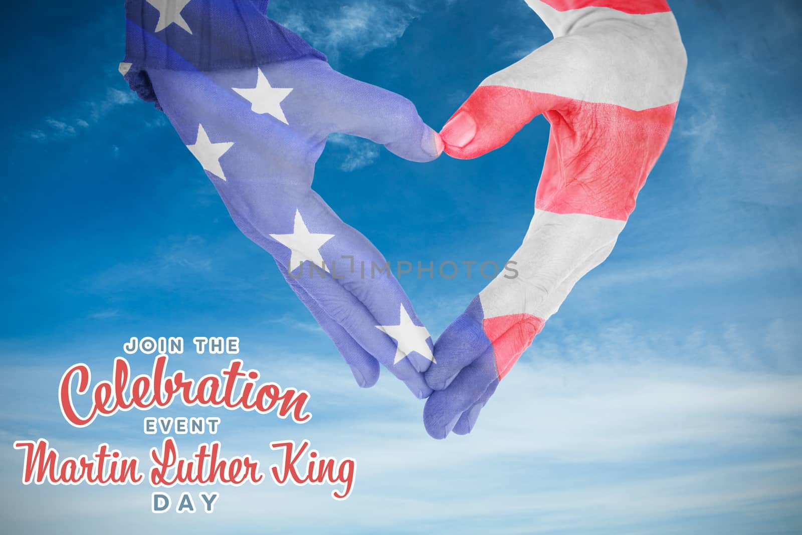 USA flag painted on hands making heart shape against low angle of cloudy sky 