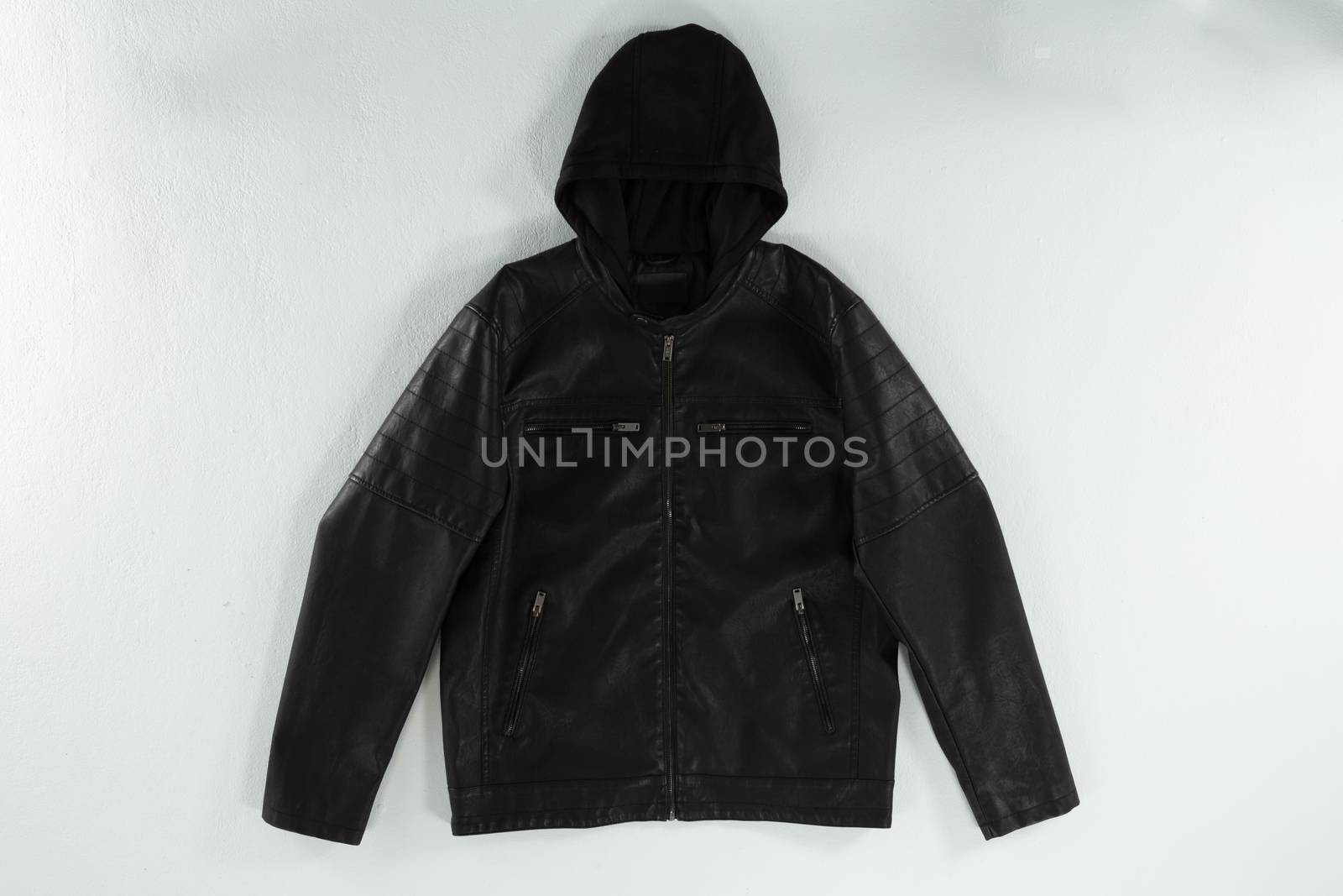 Close-up of hoodie jacket on white background