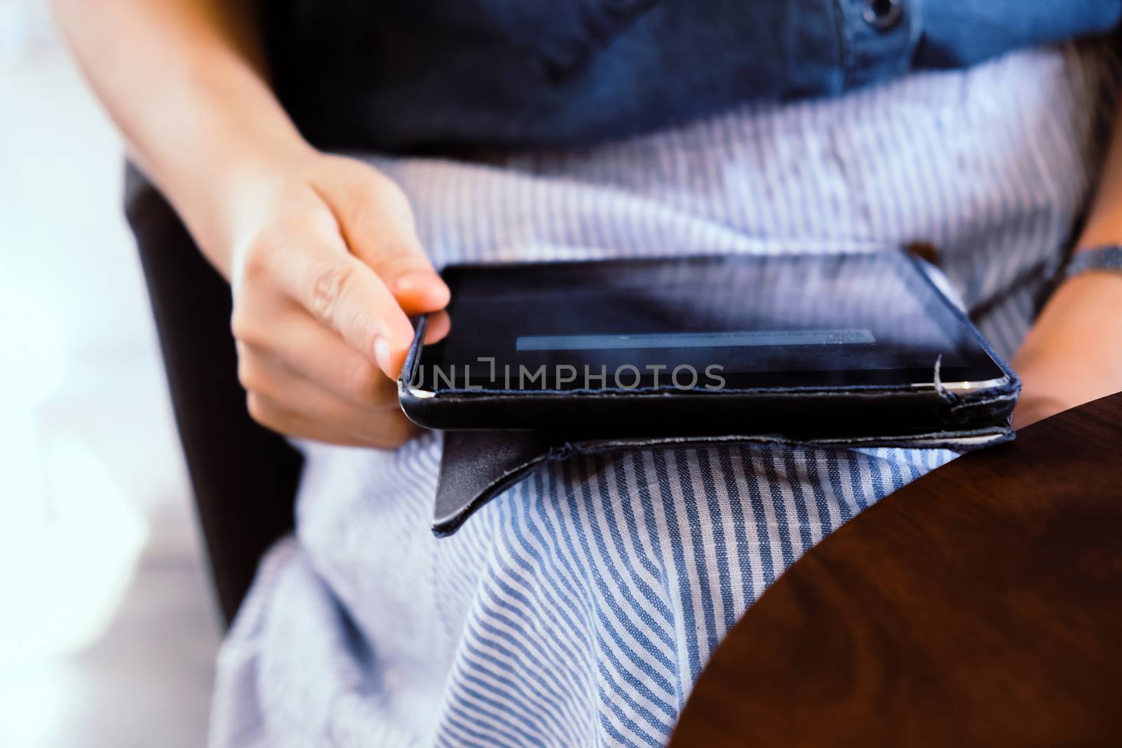 image of people using a digital tablet