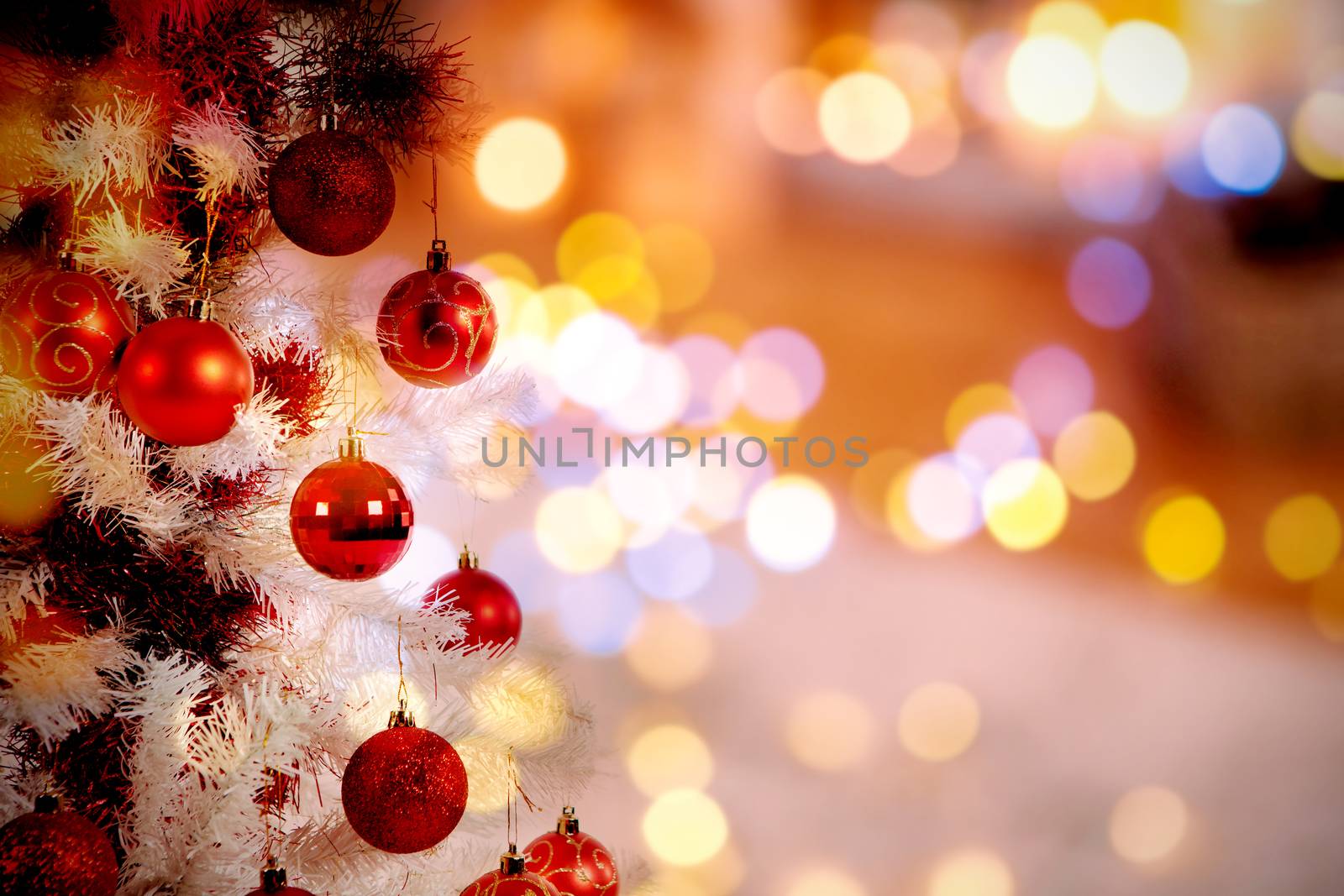 Christmas yellow circle lights against christmas tree with copy space