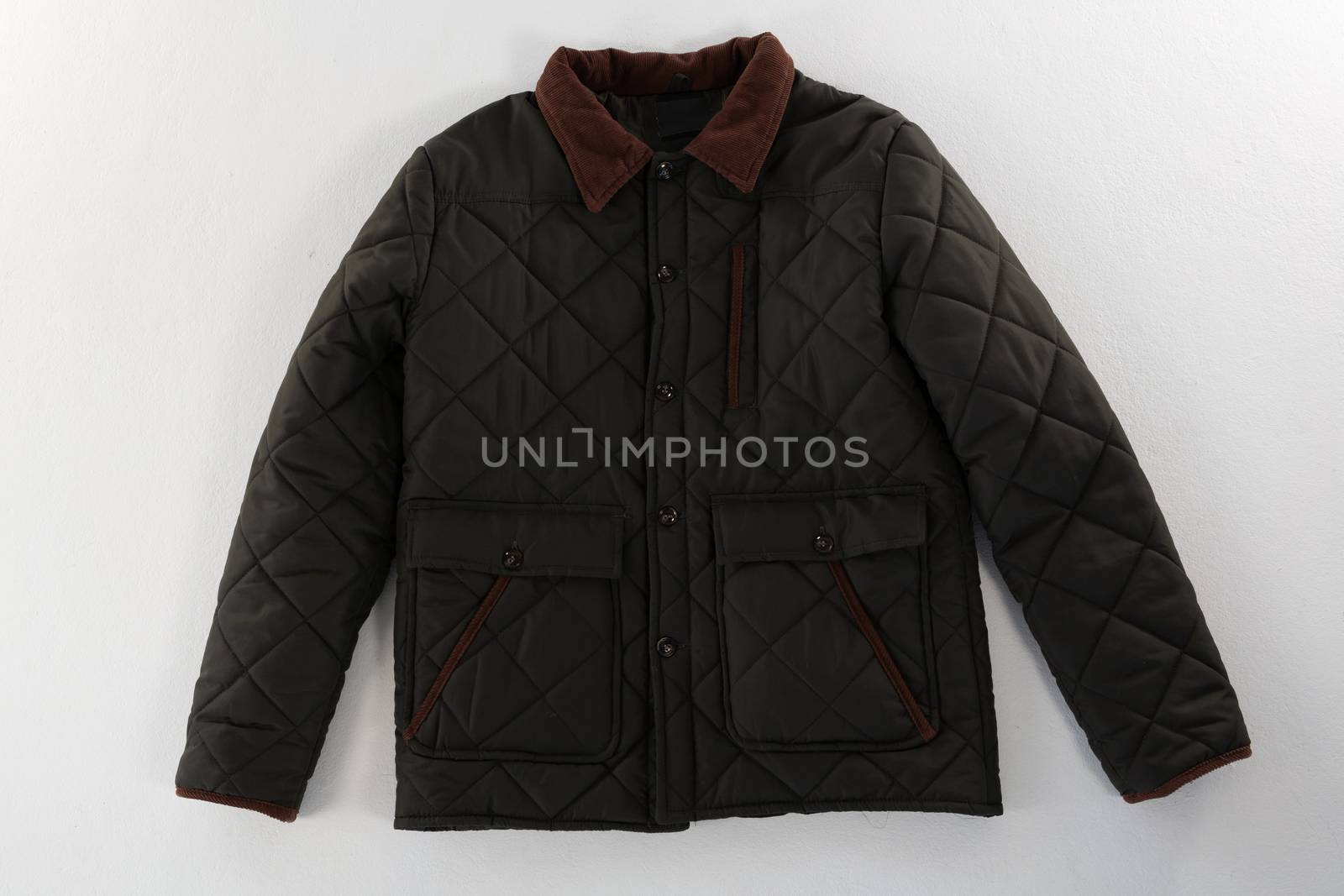 Close-up of jacket on white background