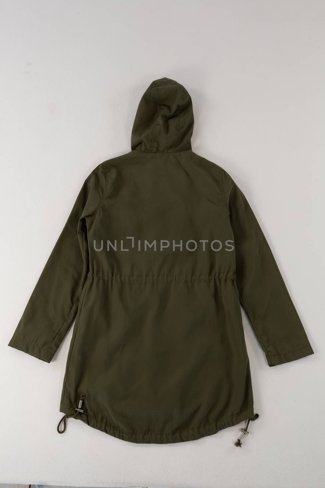 Close-up of hoodie jacket on white background