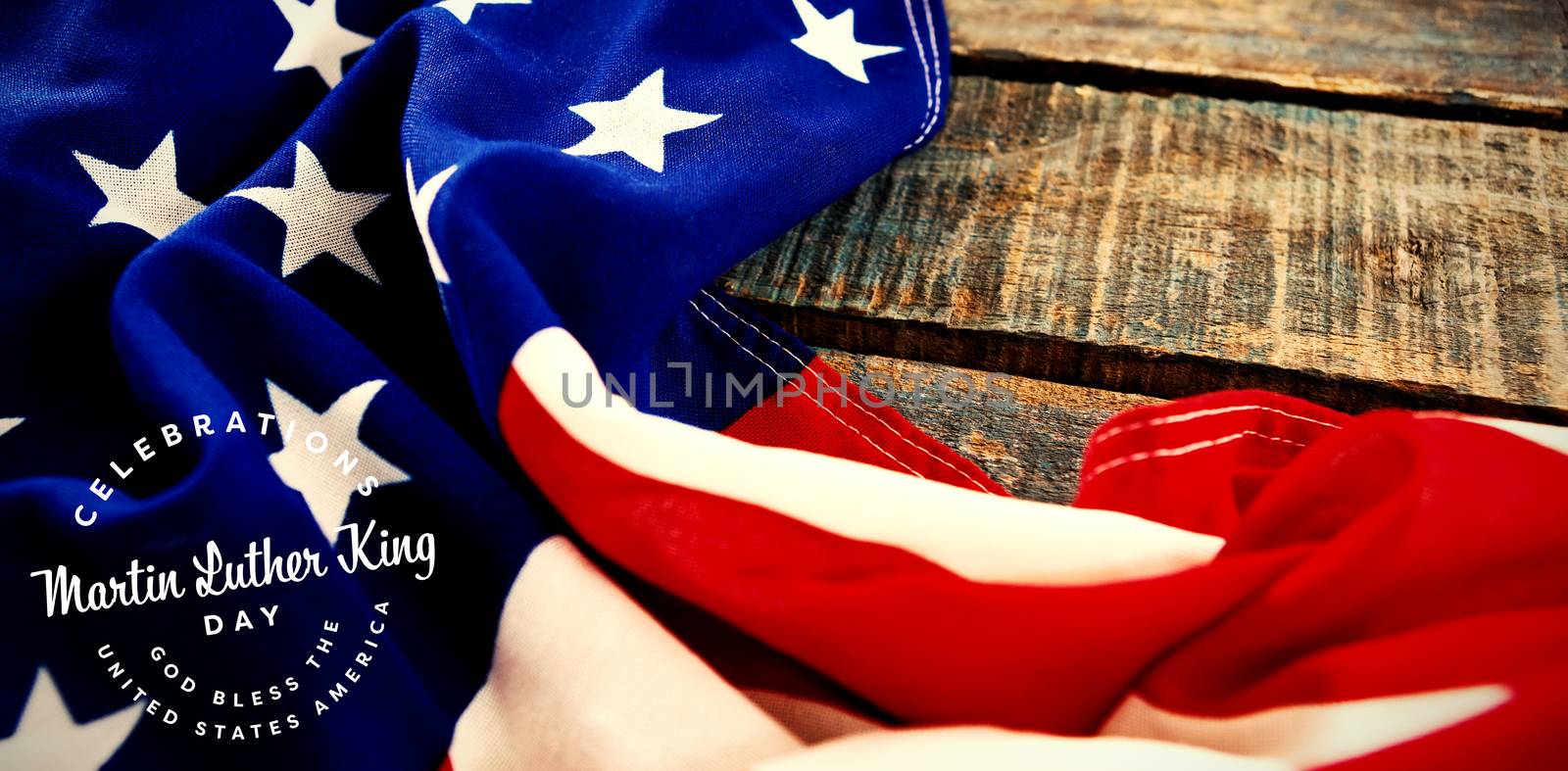 Martin Luther king day against american flag on table