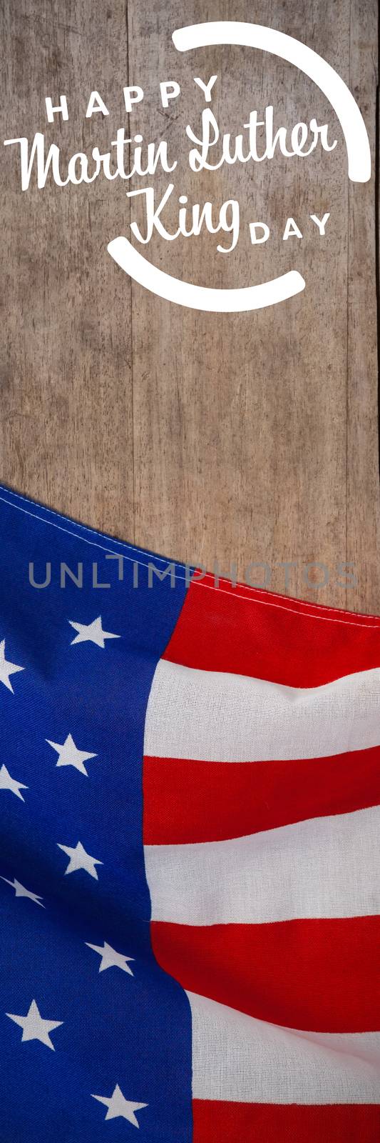 happy Martin Luther King day against american flag on a wooden table
