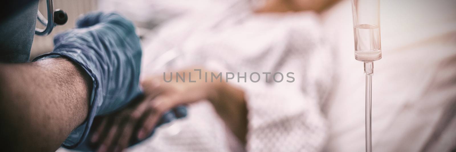 Nurse giving an injection to a patient at the hospital