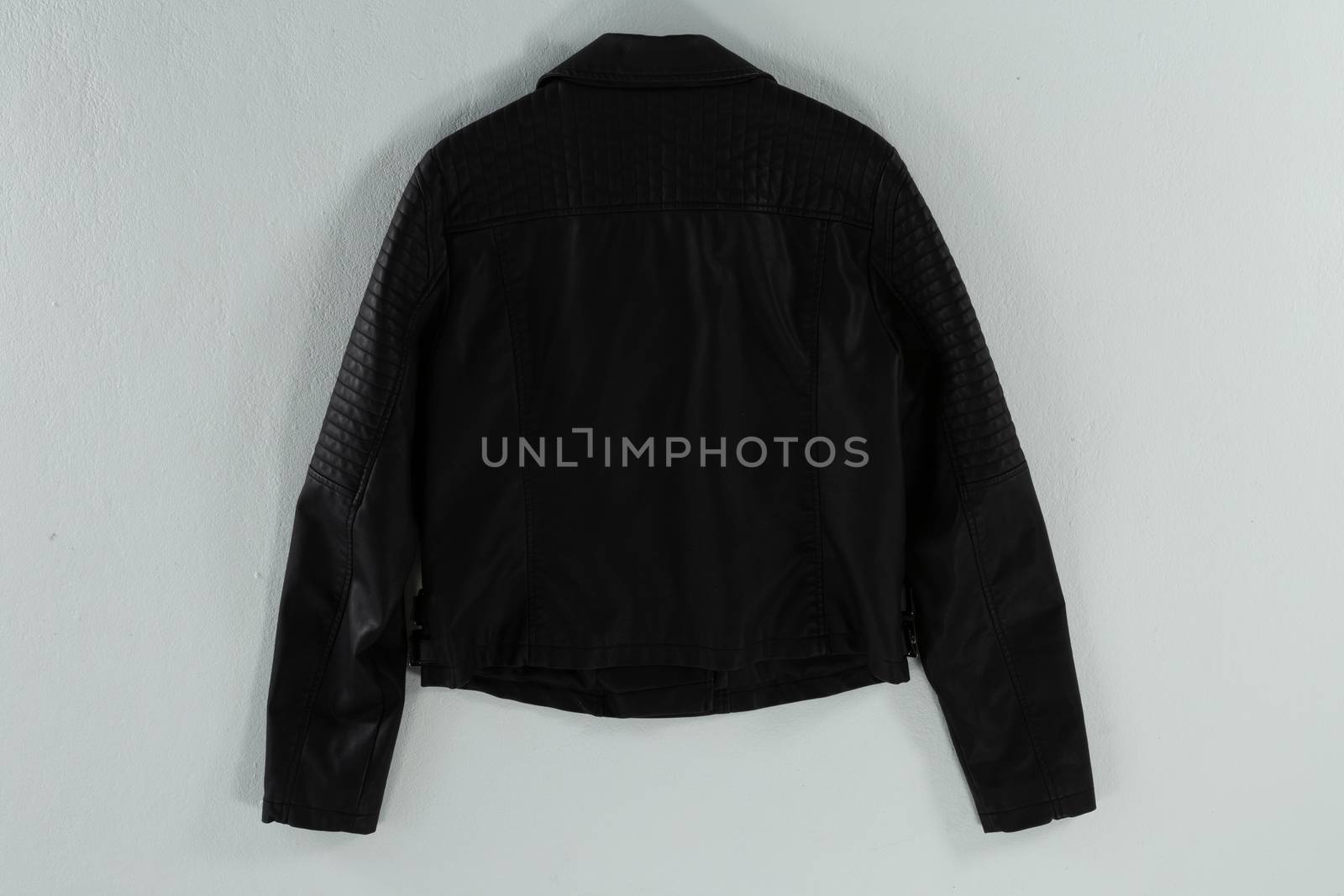 Close-up of jacket on white background