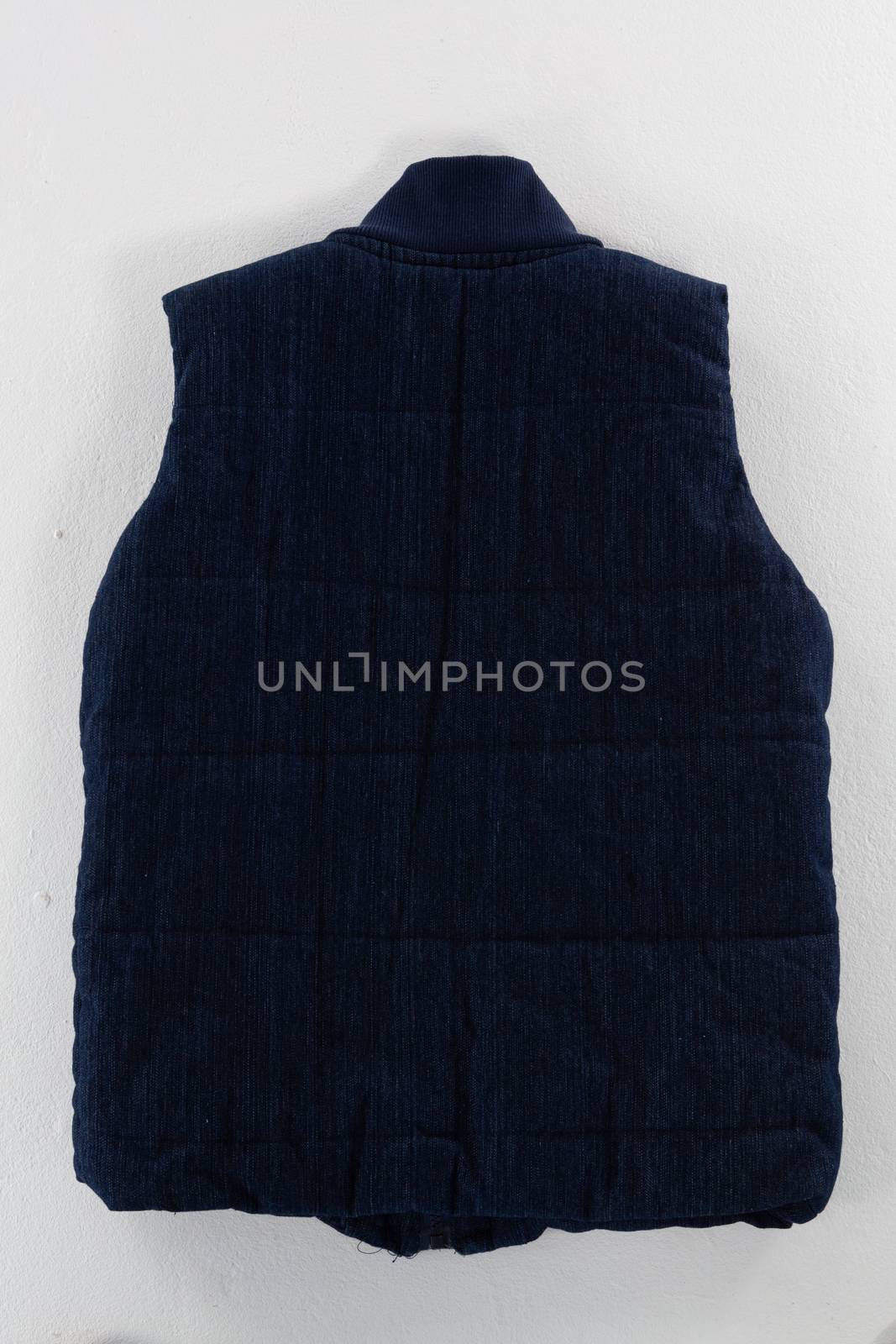 Close-up of jacket on white background