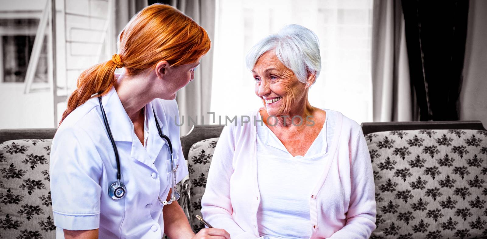 Doctor consulting with senior woman  by Wavebreakmedia