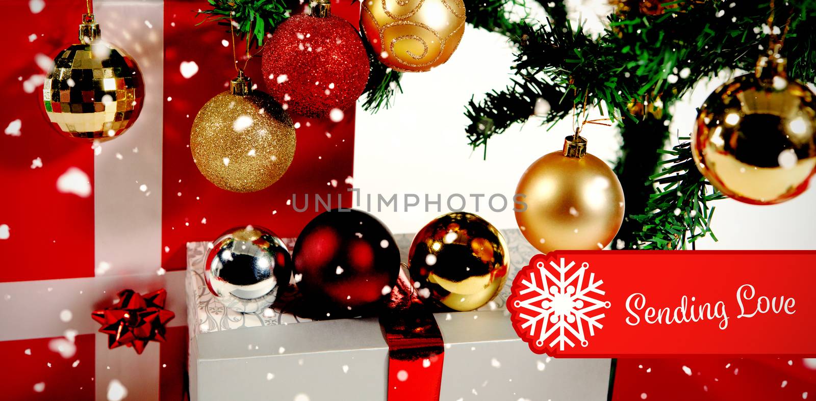 Banner sending love against close-up of christmas decorations