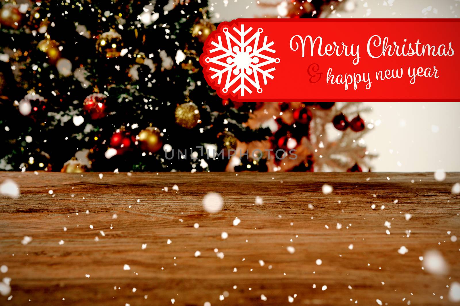 Banner Merry Christmas against wooden table in christmas tree in background
