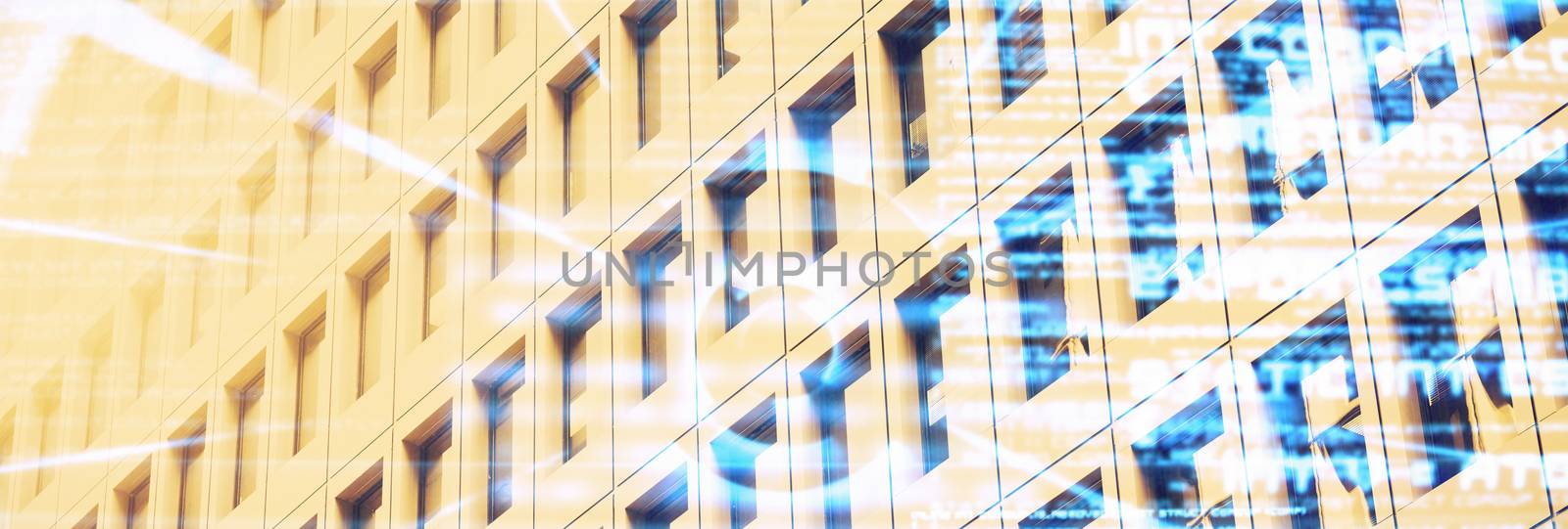 Close-up of office building  against abstract blue text