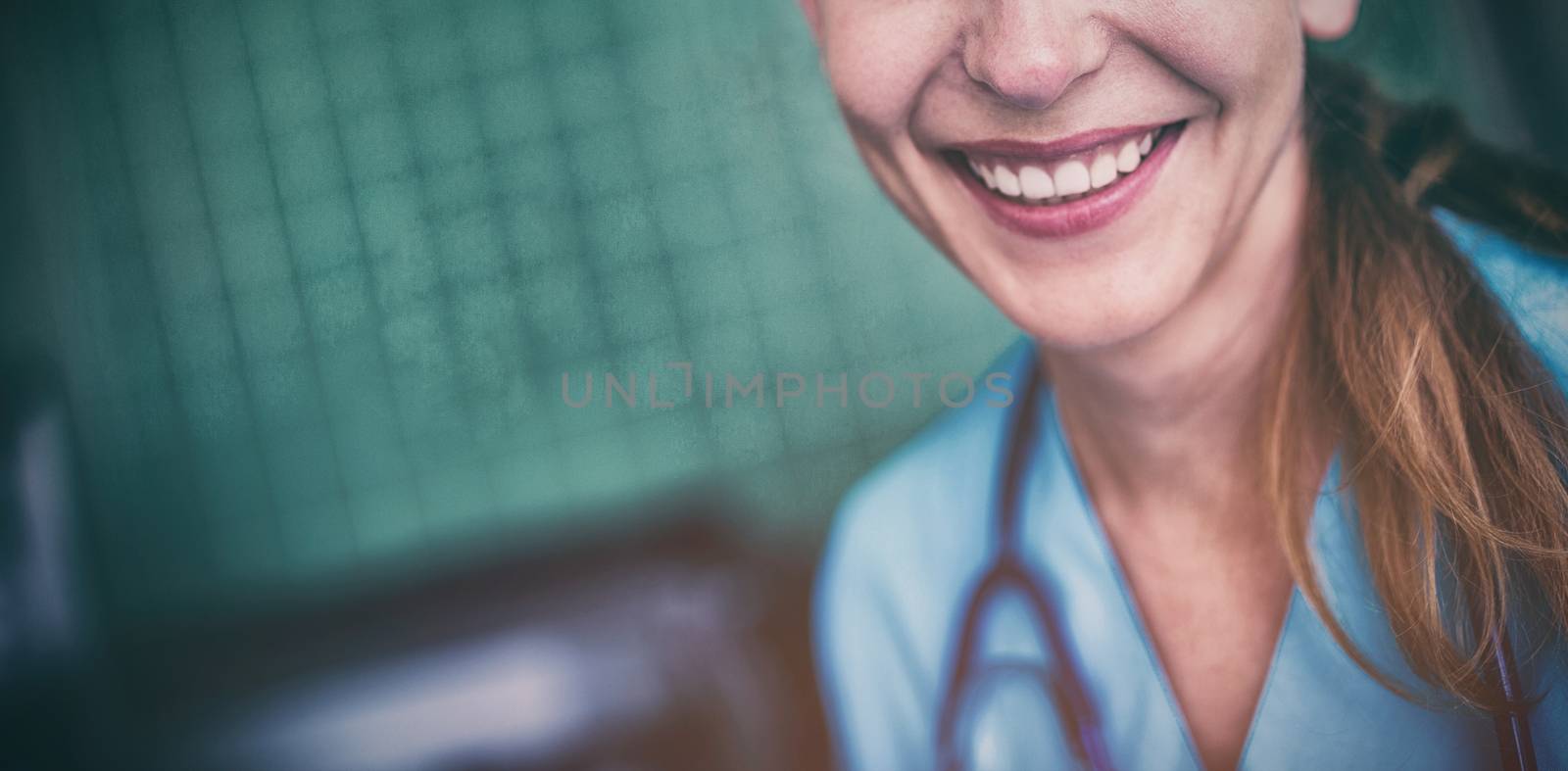 Portrait of nurse smiling at camera in the hospital
