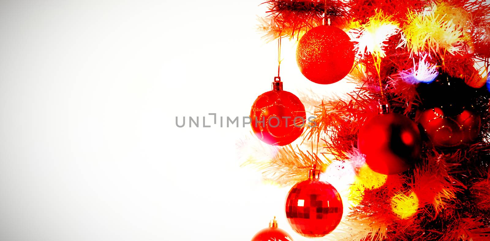 Composite image of table against copy space with christmas tree