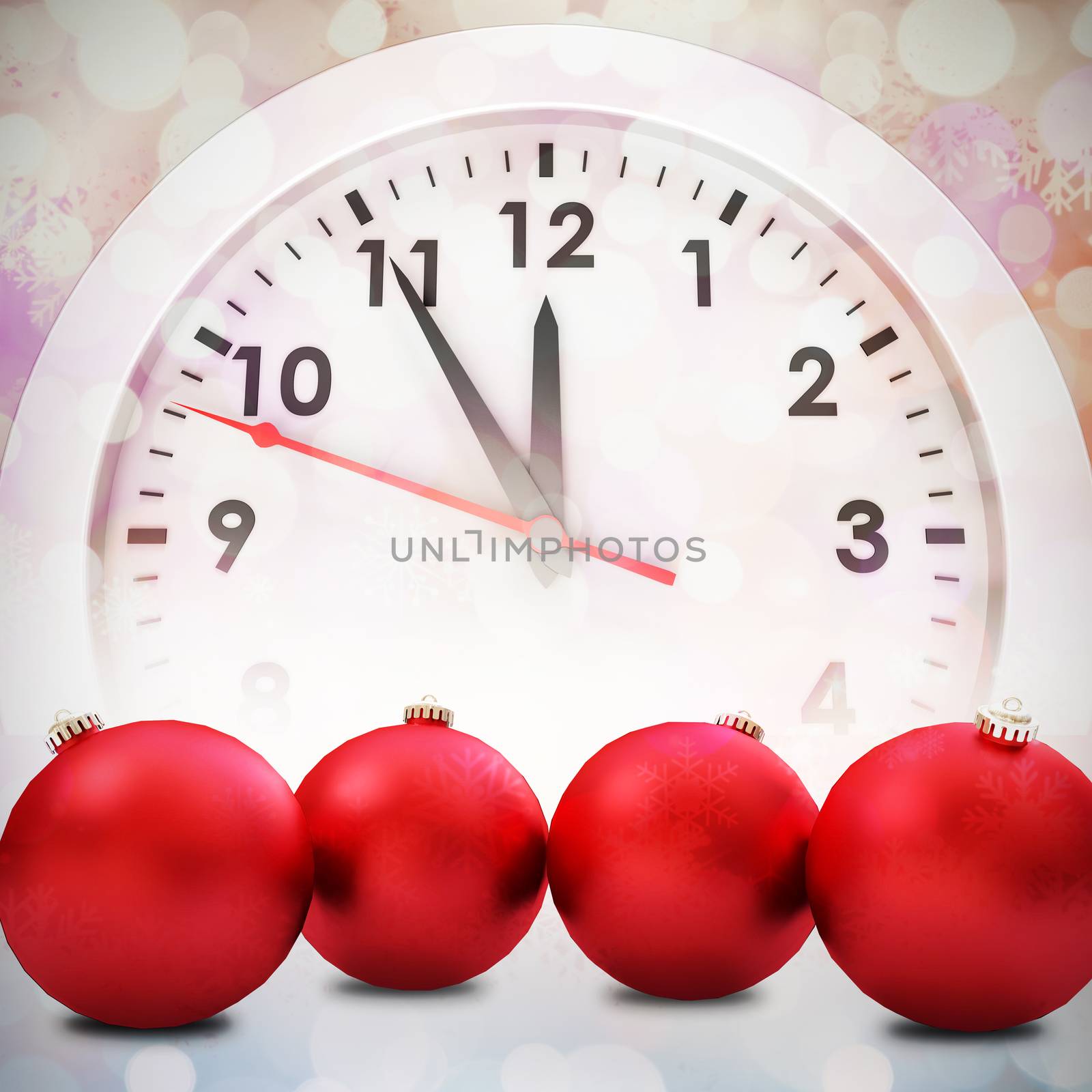 Red baubles christmas decoration against glowing christmas background