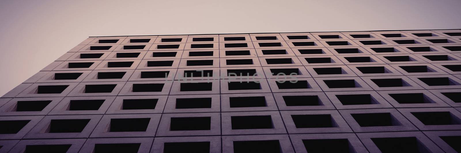 Low angle view of office building by Wavebreakmedia