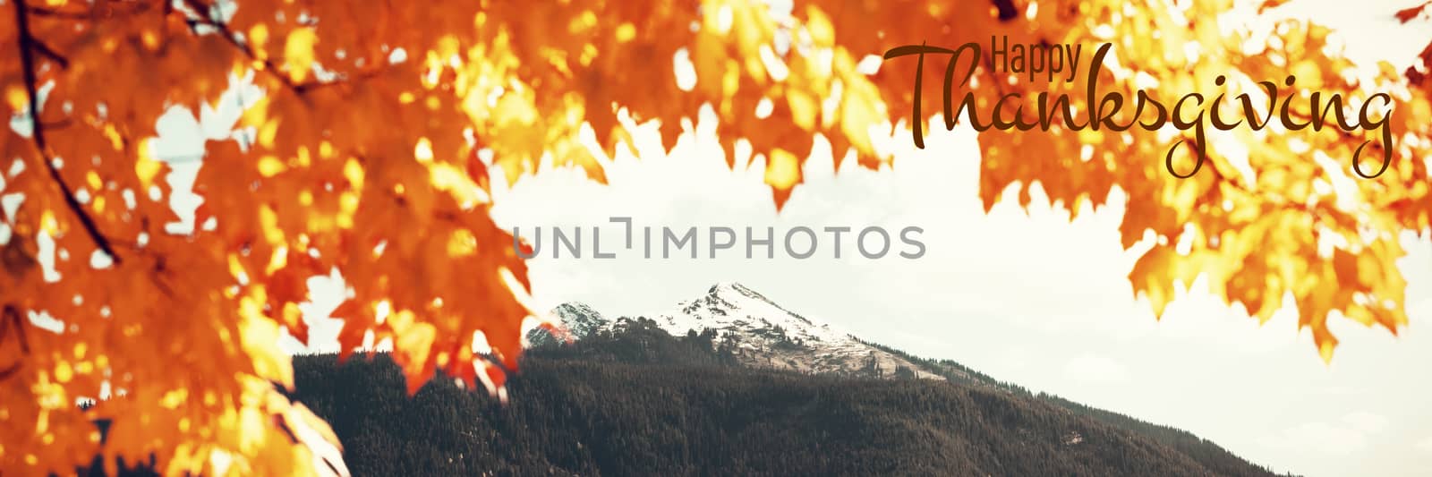 Illustration of happy thanksgiving day text greeting against leaves and snow capped mountain