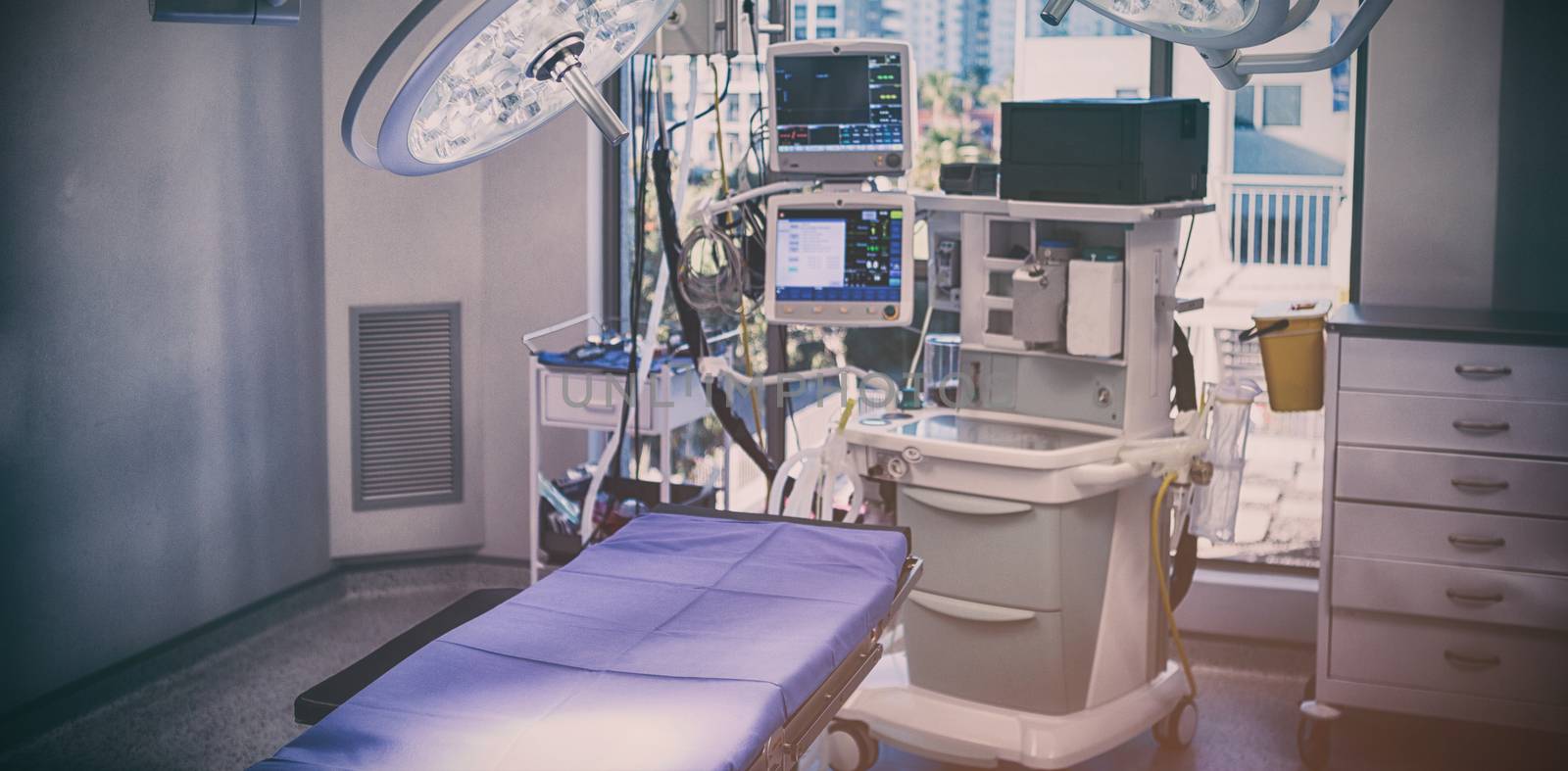 Equipment and medical devices in modern operating room by Wavebreakmedia
