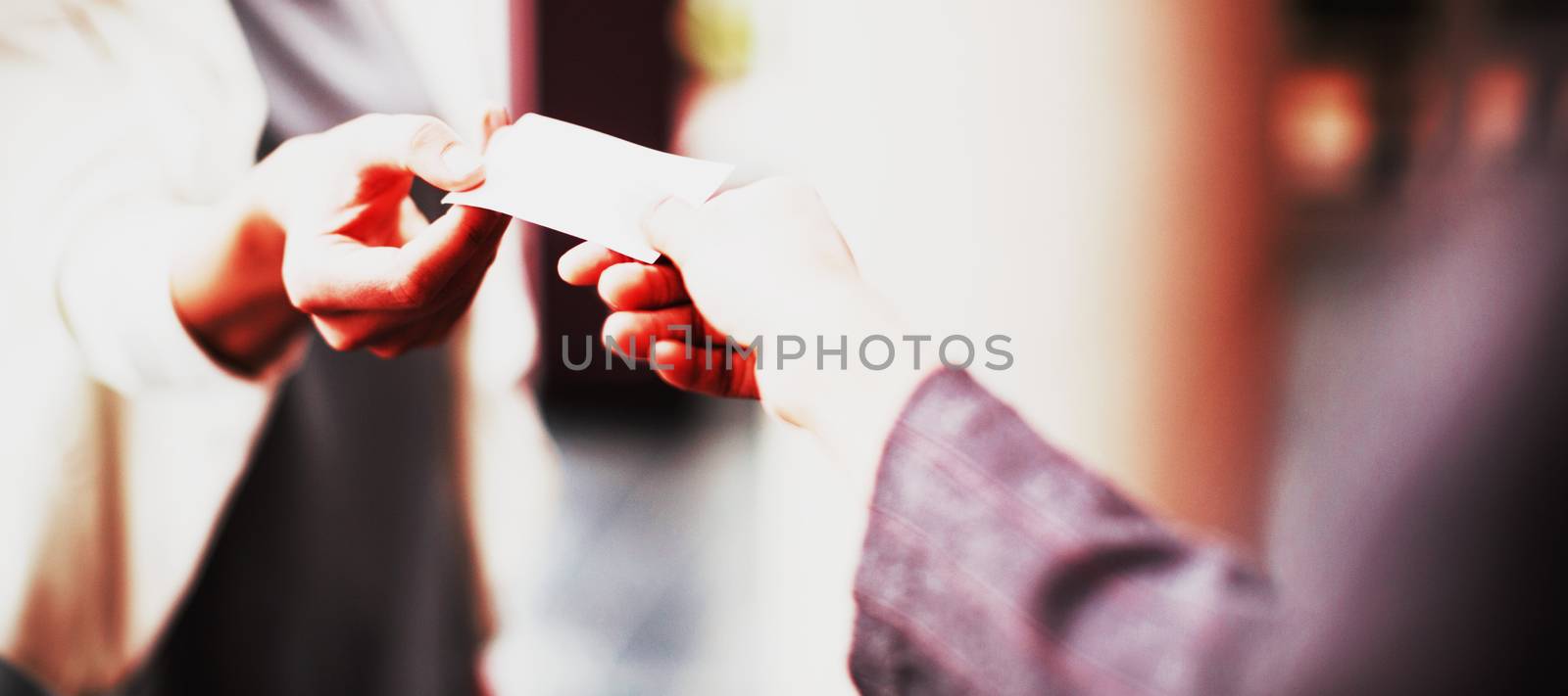 Business executives exchanging business card  by Wavebreakmedia