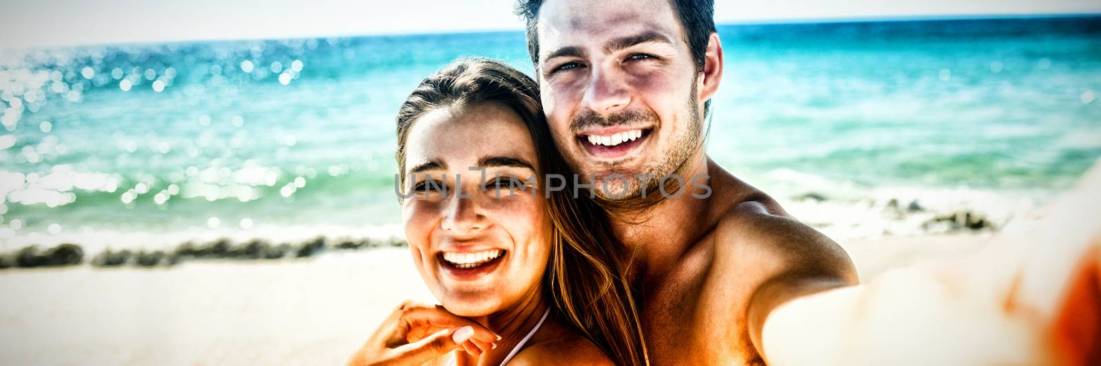 Couple taking a selfie by Wavebreakmedia