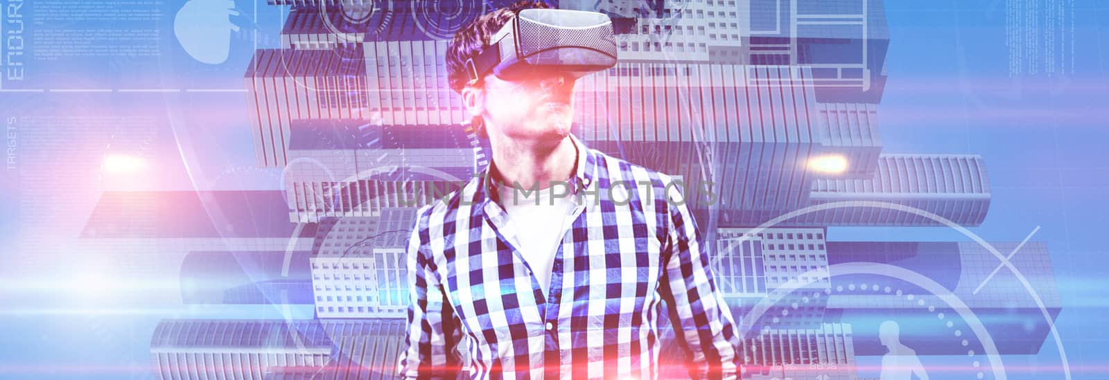 Young man wearing virtual reality glasses against composite image of fitness interface