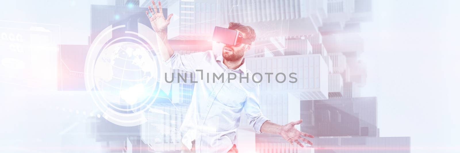 Happy male using oculus rift headset against composite image of technology interface 