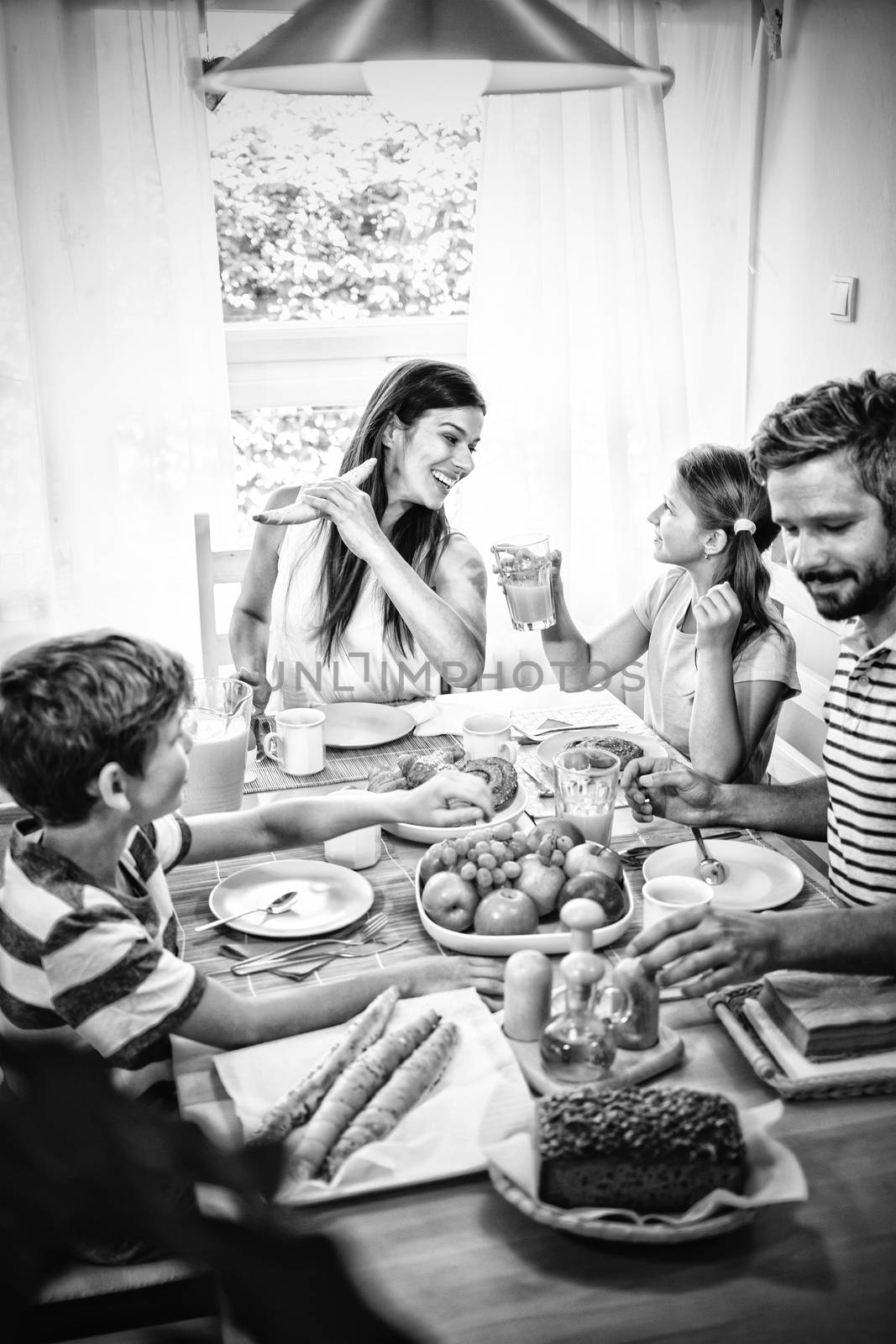 Family having breakfast together by Wavebreakmedia