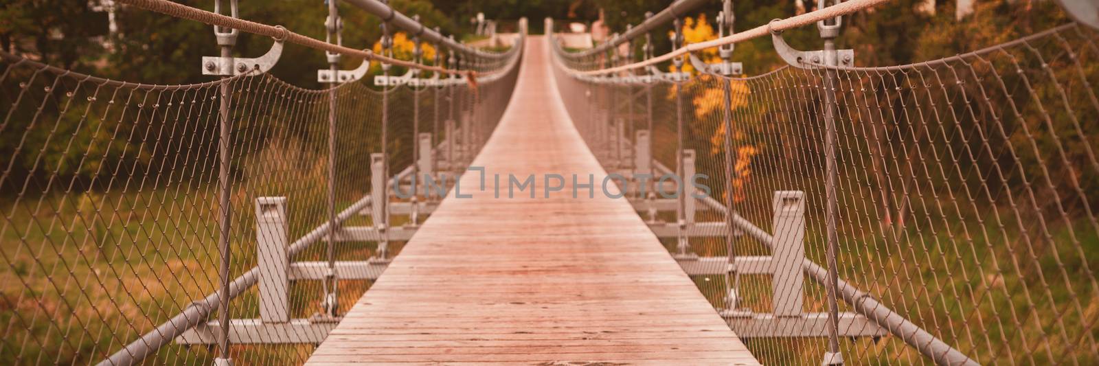 Close-up of wooden bridge at countryside