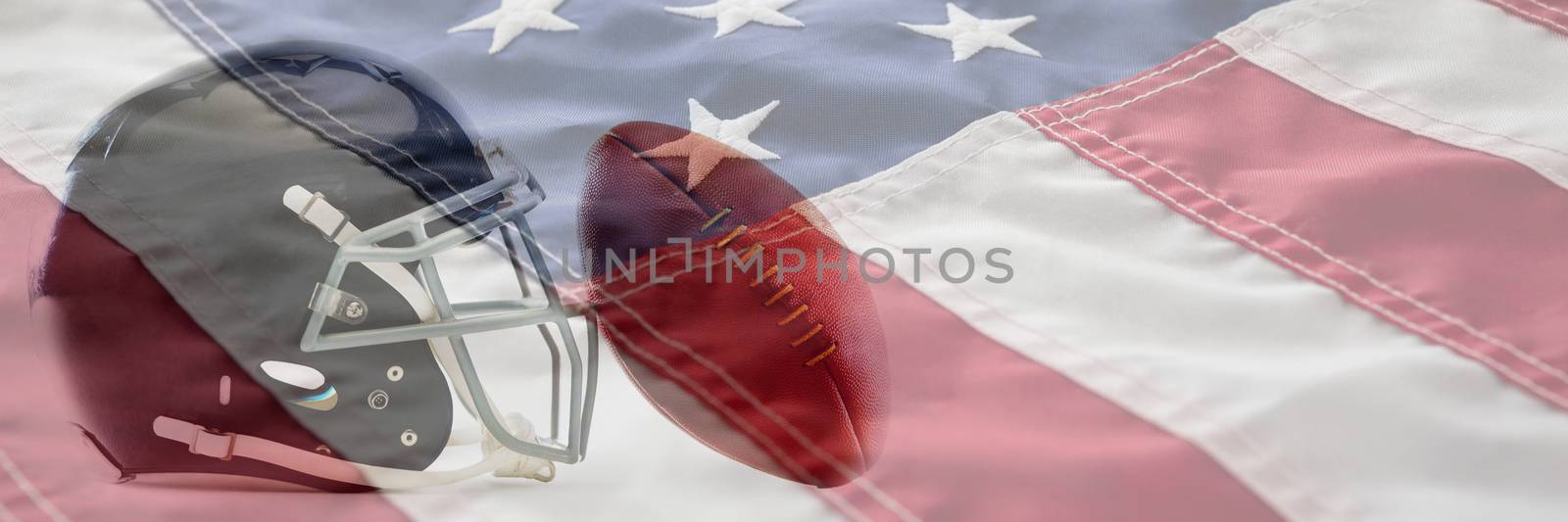 Close-up of American football and helmet against close-up of cropped american flag