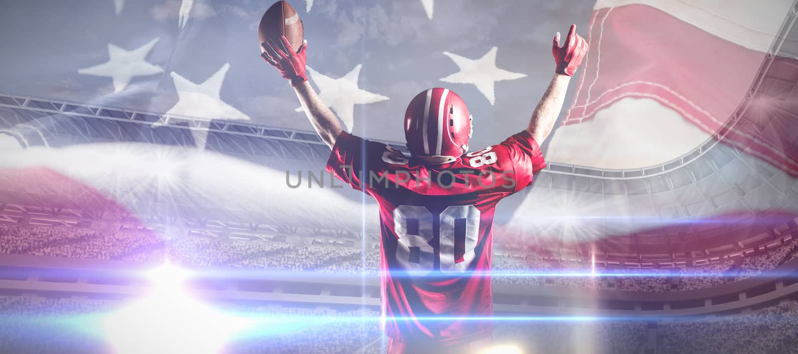 American football player in helmet holding rugby ball with arms in the air against full frame of american flag