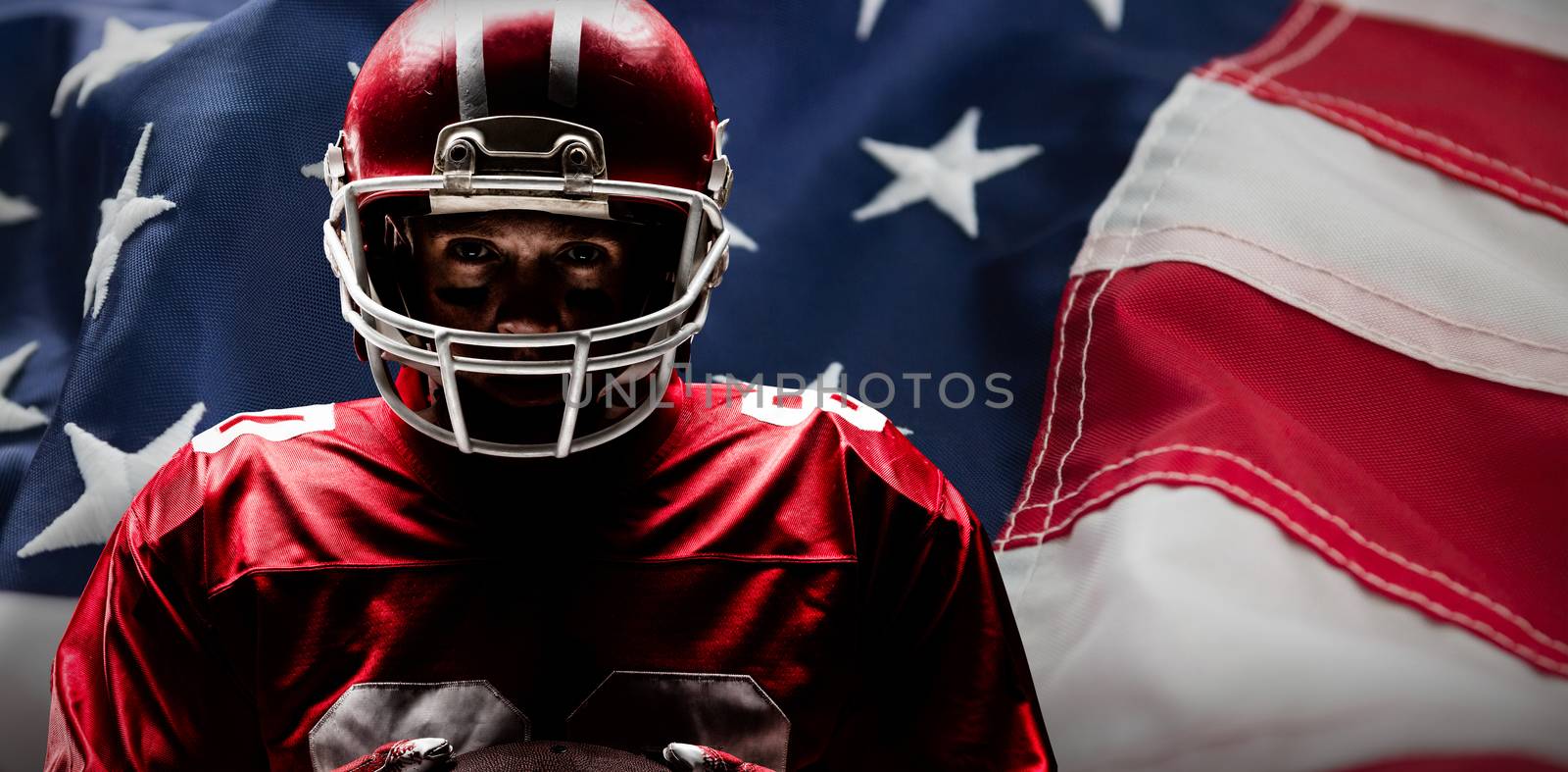Composite image of american football player standing in helmet by Wavebreakmedia