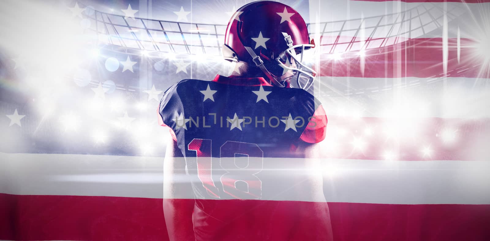 American football player standing in rugby helmet against directly above shot of national flag