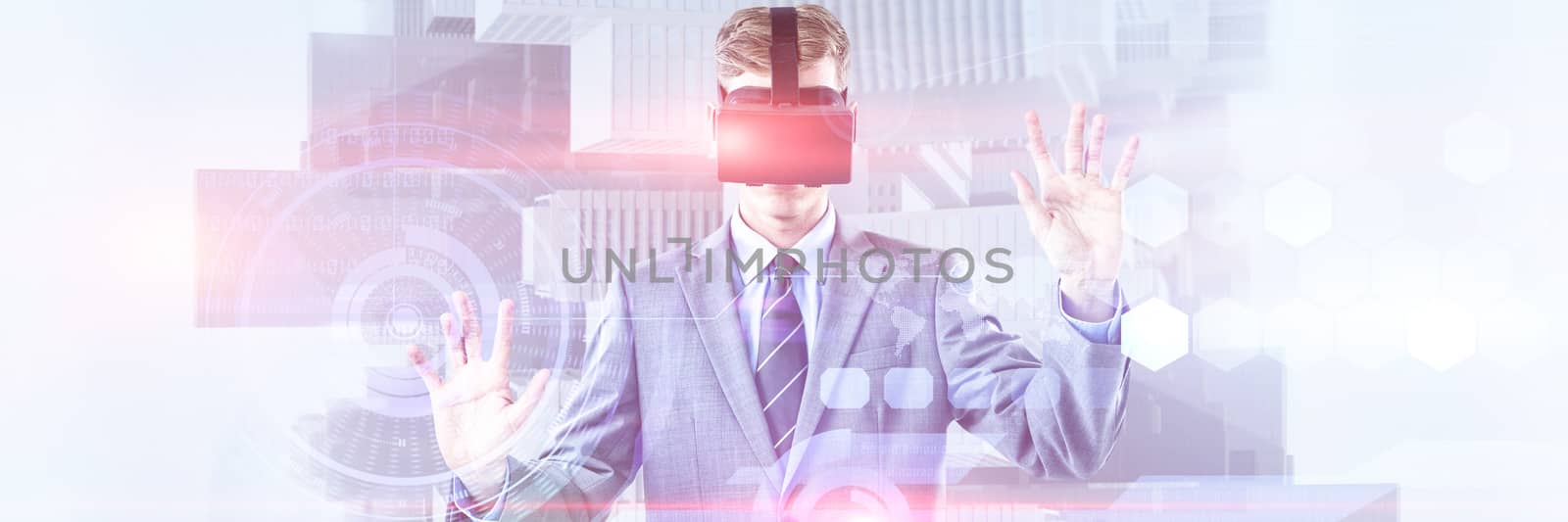 Composite image of businessman using virtual reality headset by Wavebreakmedia