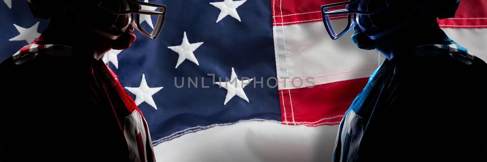 American football player standing in helmet against full frame of american flag