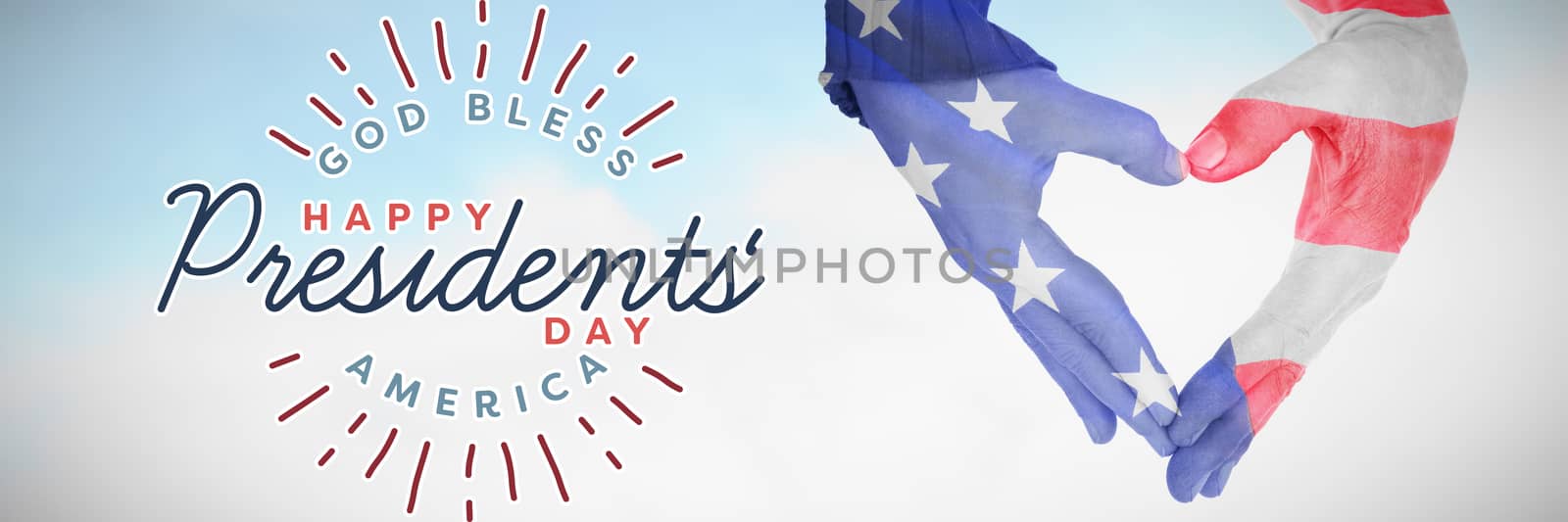 USA flag painted on hands making heart shape against blue sky with clouds 