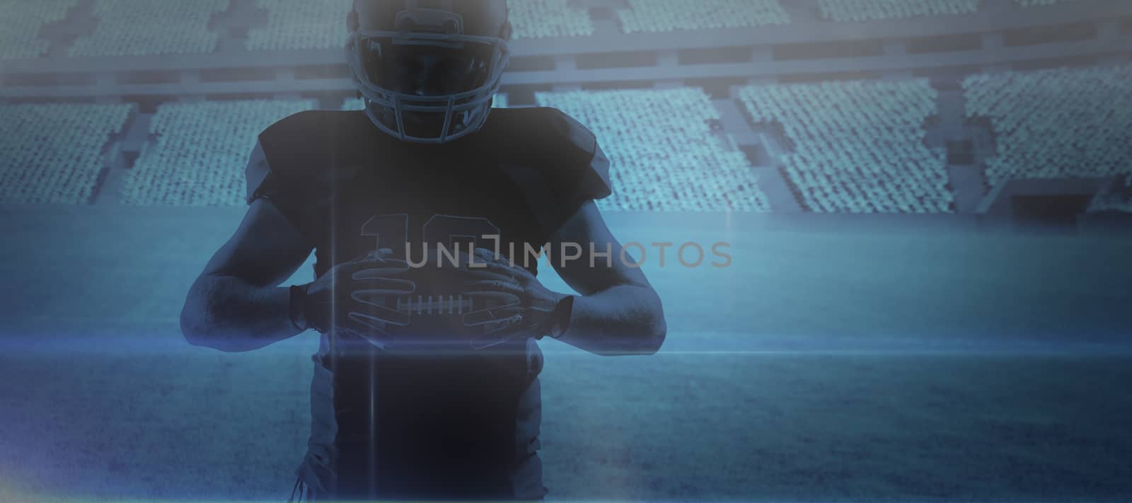 American football player in helmet standing with rugby ball against digital image of rugby stadium