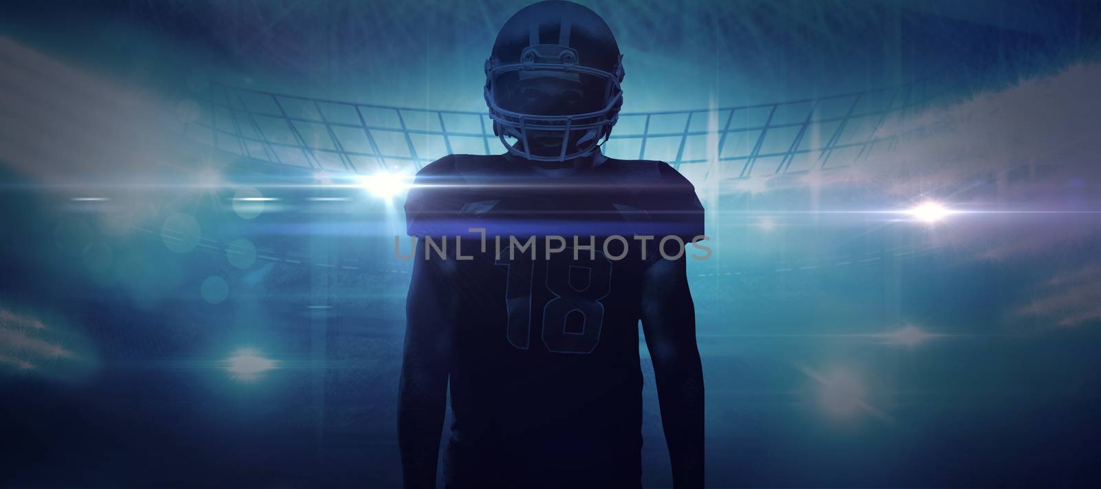 American football player standing in helmet against american football arena