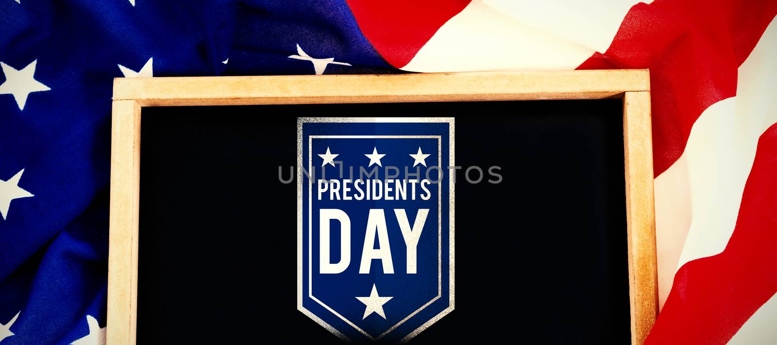 presidents day icon against blank slate on american flag