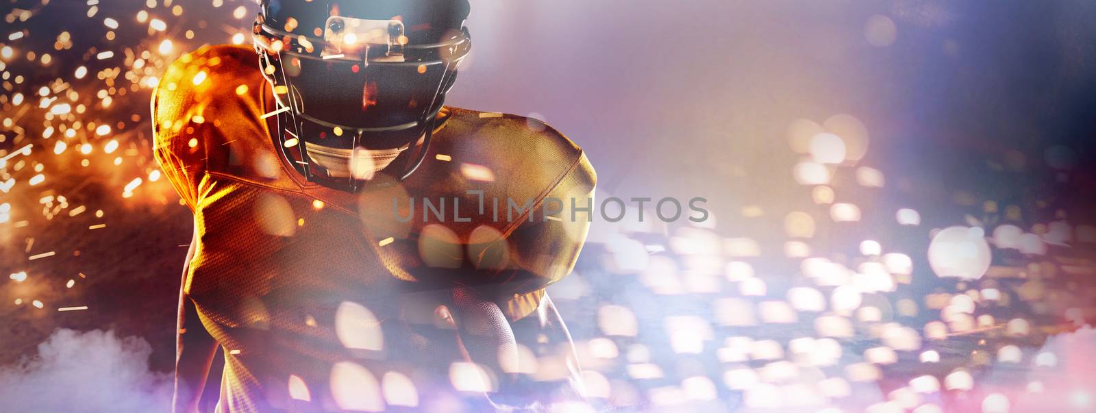 Portrait of determined American football player holding ball against firework bursting sparkle background