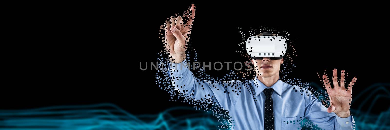 Businessman gesturing while wearing futuristic glasses against futuristic glowing lines on black background