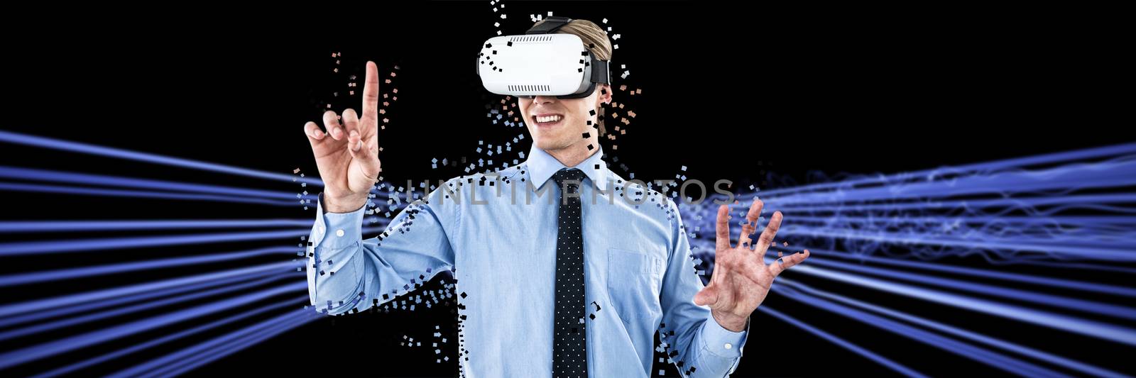 Composite image of happy young businessman gesturing while wearing futuristic glasses by Wavebreakmedia