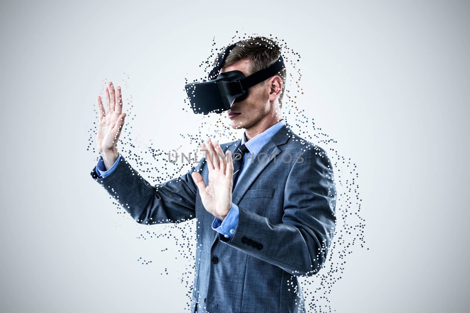 Businessman using virtual reality headset against abstract blue background