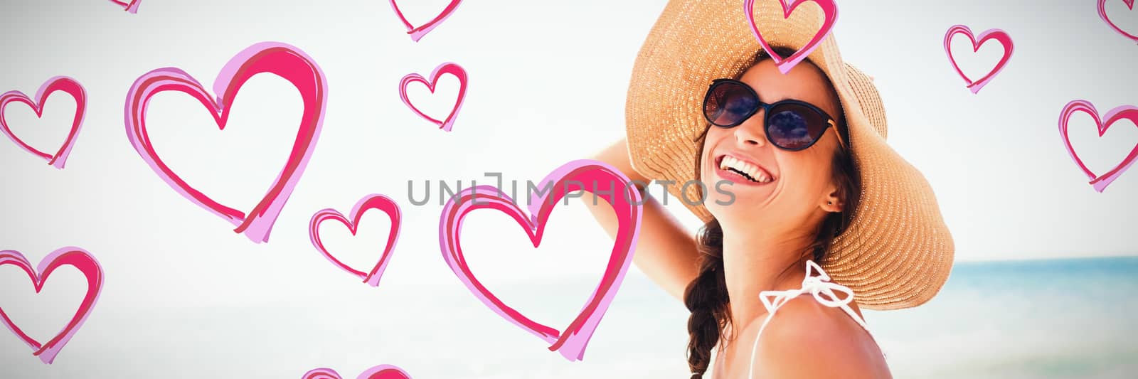 Red Hearts against  portrait of smiling woman on the beach Portrait of smiling woman on the beach on a sunny day