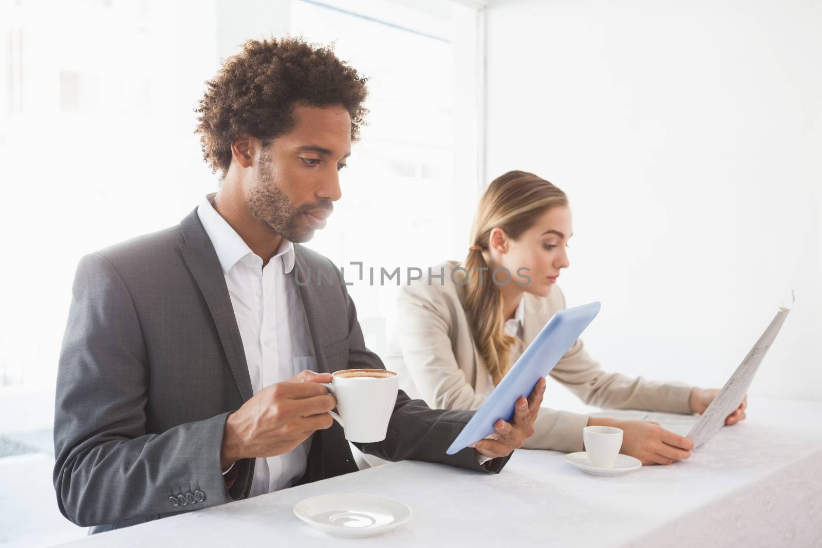 Business people having coffee on their break by Wavebreakmedia