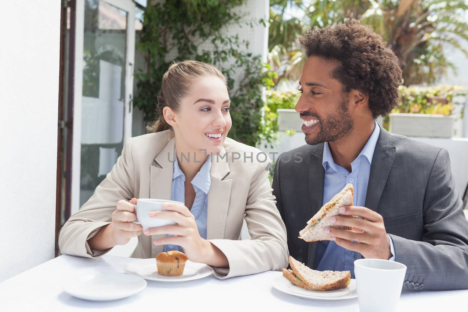 Happy business people on their lunch by Wavebreakmedia