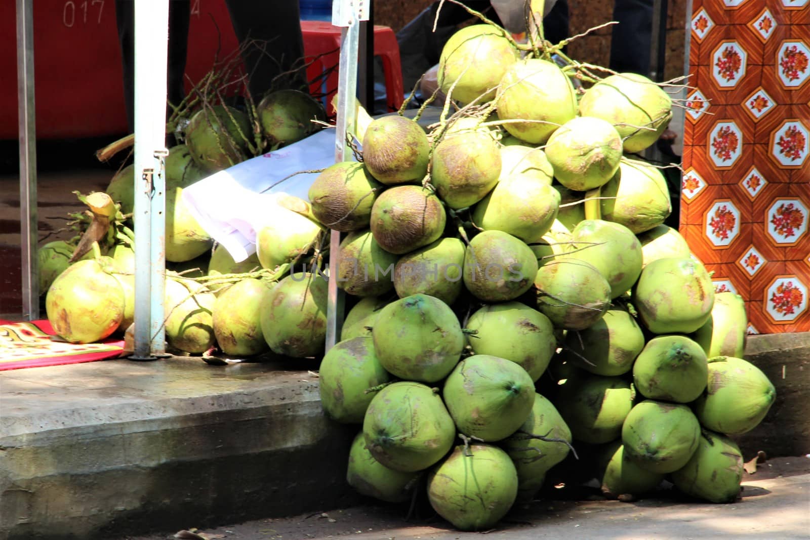 Coconuts in a big pile ready to sell